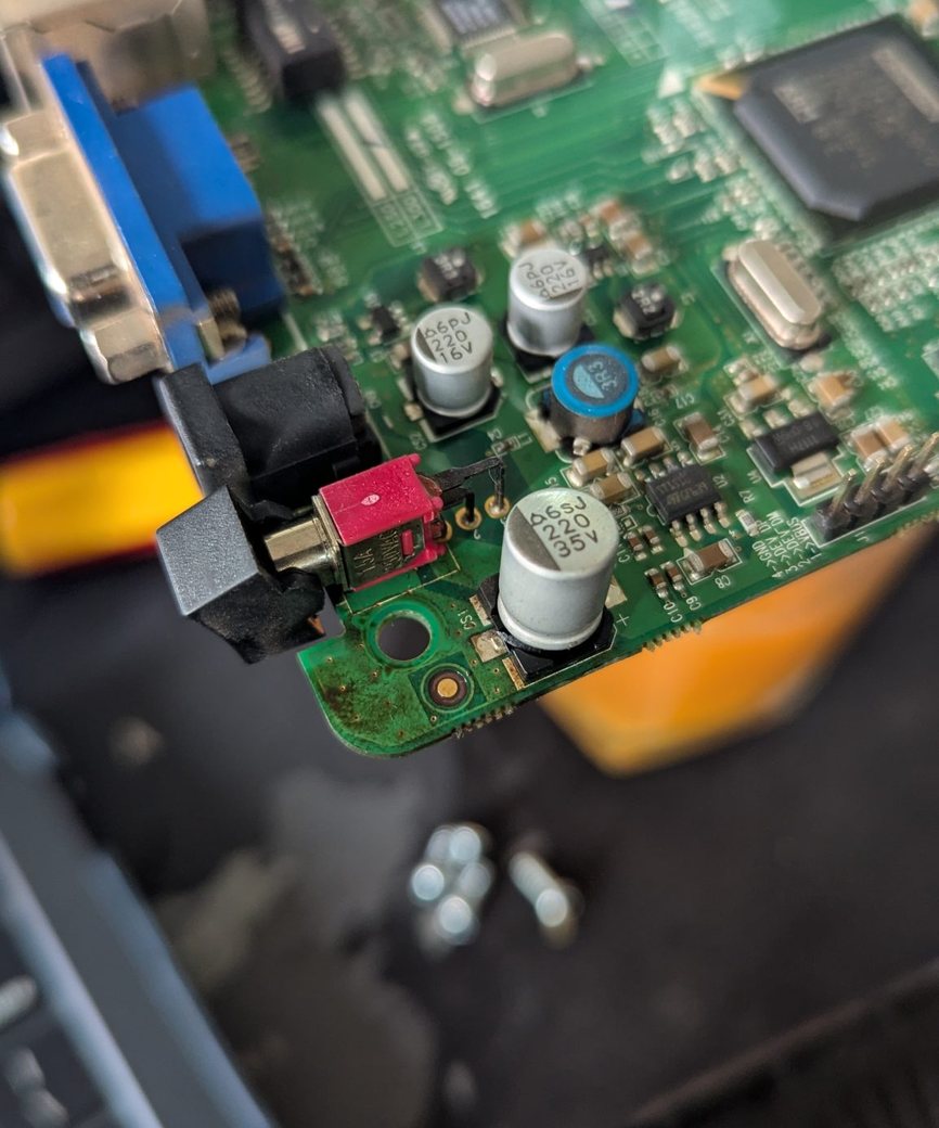 Close-up of a populated green printed circuit board
